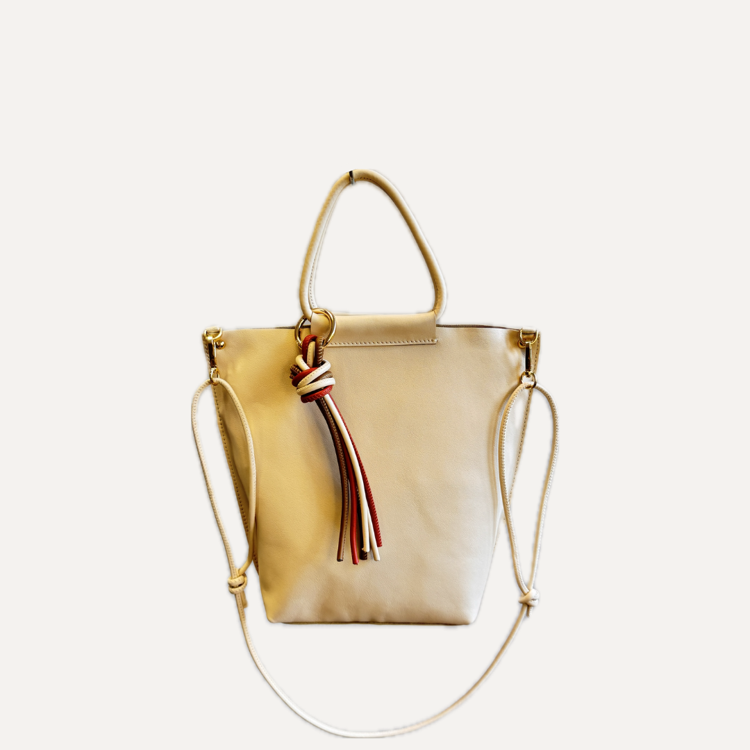 THE MINI NEREA BAG - Bolso en piel vacuno color NATA con BANDOLERA