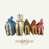 THE MINI JULIA BAG ZARAUZ - Bolso en PIEL con fleco de rafia color CALABAZA
