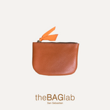 MONEDERO CREMALLERA en piel vacuno color NARANJA